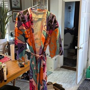 Colorful either a formal robe or a cover up for bathing suit
